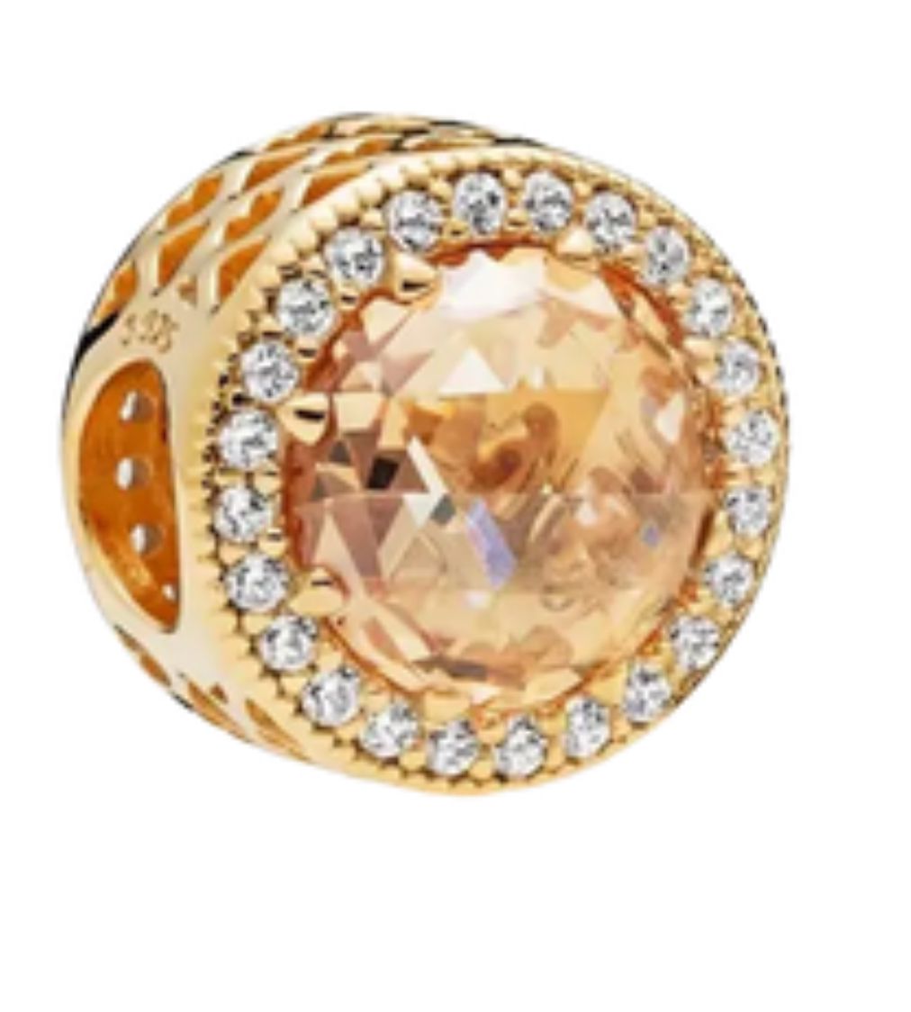 charm brillante dorado piedra amarilla
