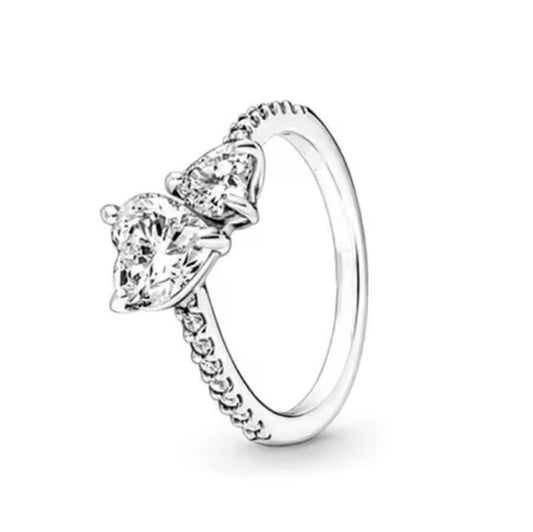 anillo p dos corazones unidos