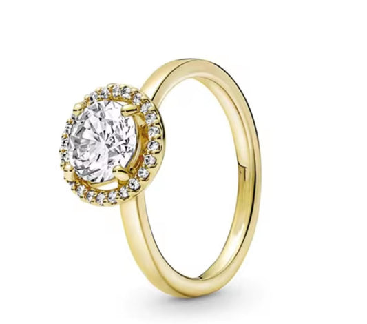 anillo p dorado circular