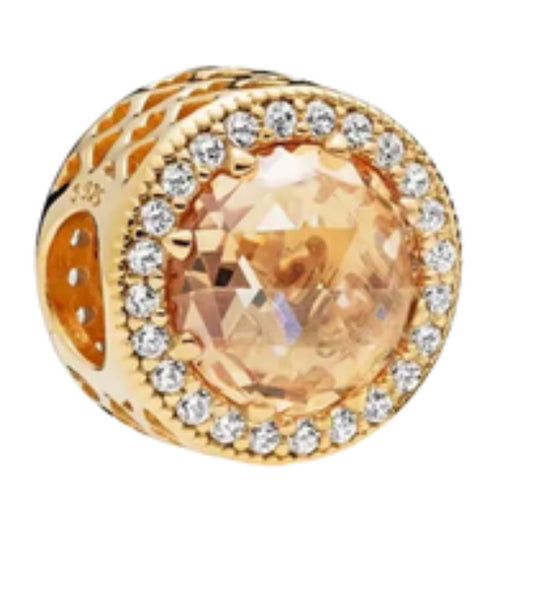 charm brillante dorado piedra amarilla