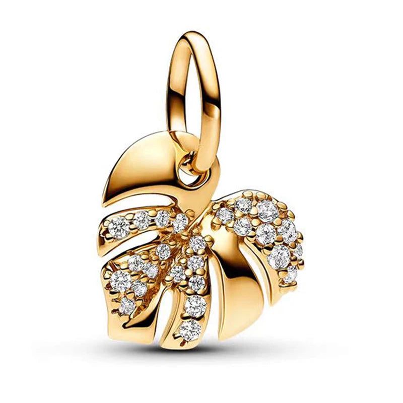 charm p hoja dorado