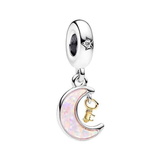 charm p luna rosa con llave dorada