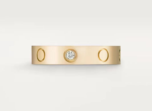 anillo C dorado